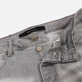 Close-up of Rosario Giuseppe Denim Jeans Metal Buttons.