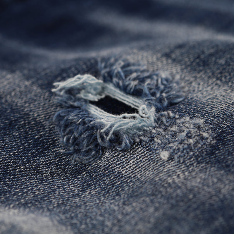 Close-up of Rosario Giuseppe Denim Jeans fabric detail.